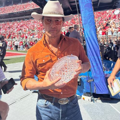 Matthew Mcconaughey with Coaches Trophy